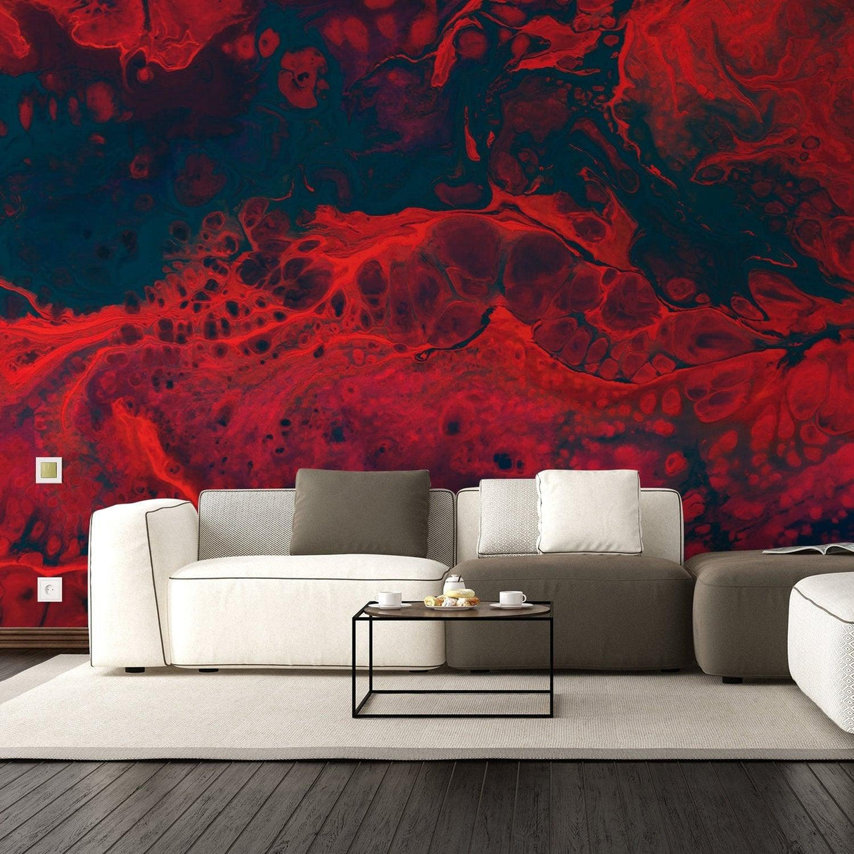 Living room featuring bold red and blue abstract wallpaper, a cozy couch, and a modern coffee table.