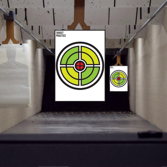 Large outdoor shooting targets set in a practice range, featuring colorful circle designs for accurate aiming.