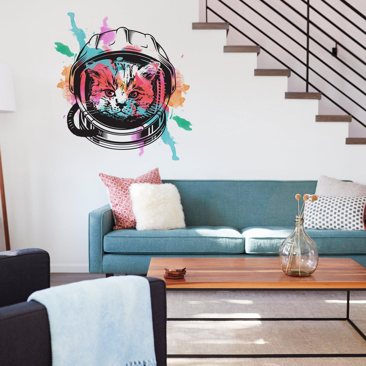 Colorful Space Cat Wall Art Transfer Sticker in a cozy living room setting with a blue couch.