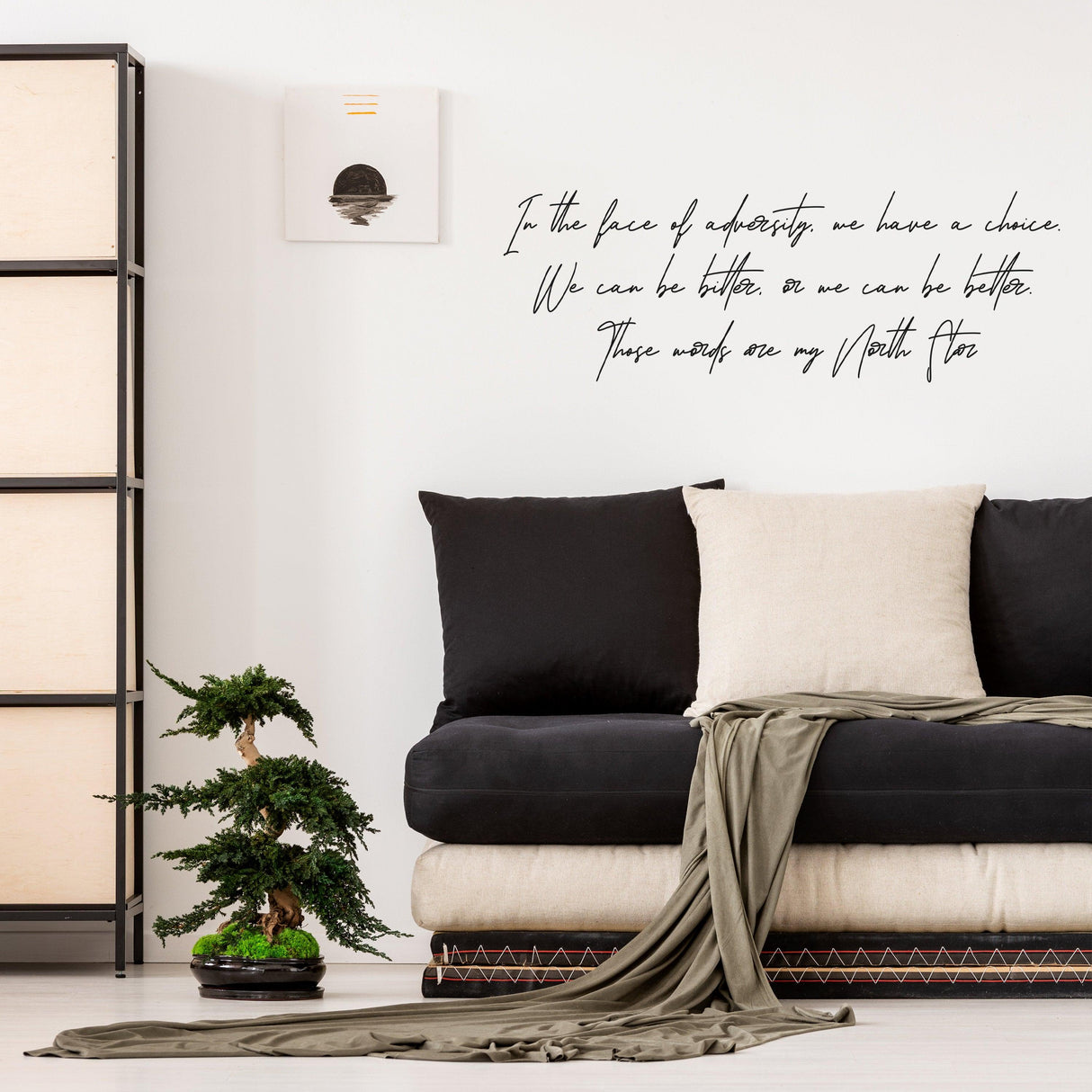 Inspirational wall decor vinyl decal with motivational quote on a stylish living room wall.