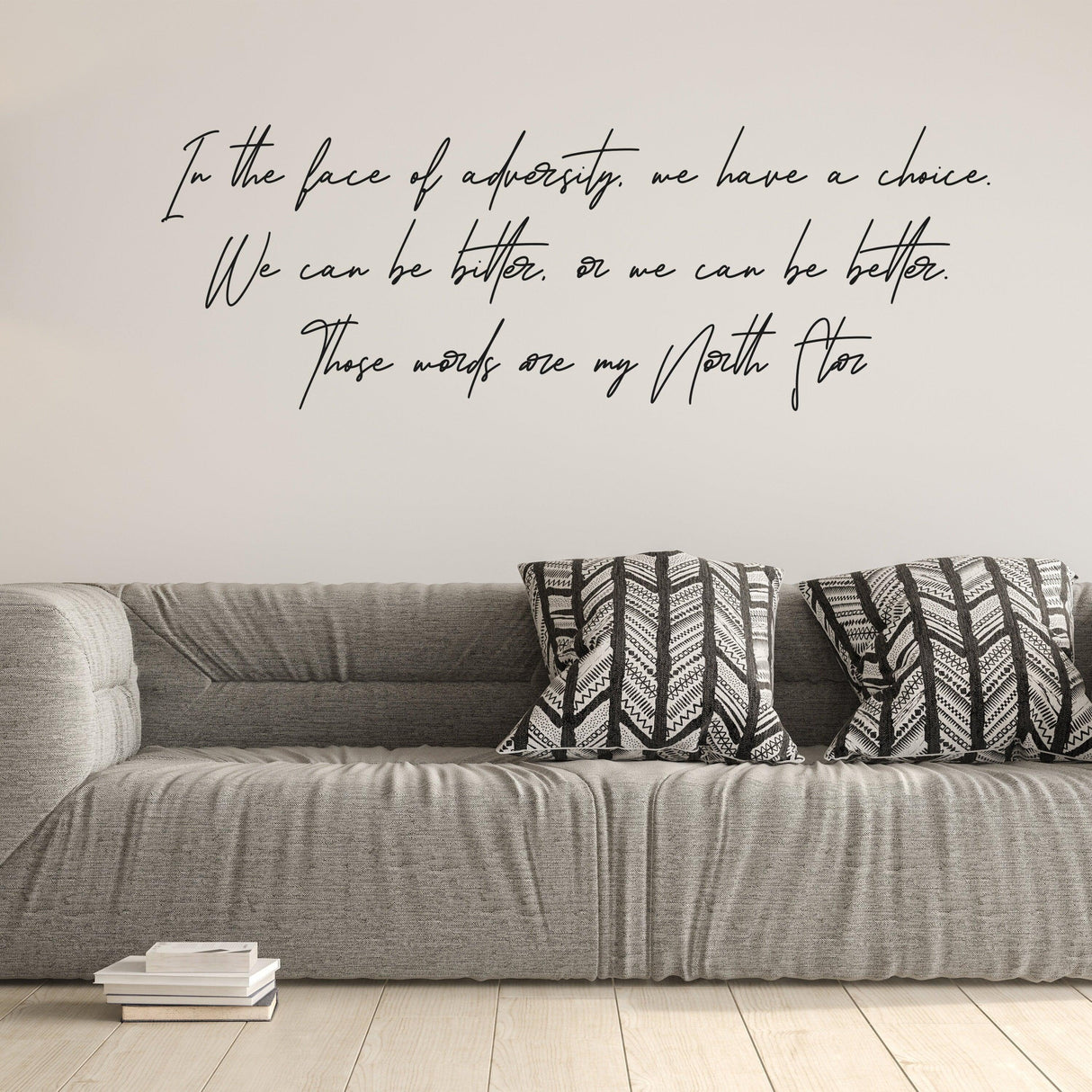 Inspirational wall decal with positive quote above a stylish sofa, adding motivation to home decor.