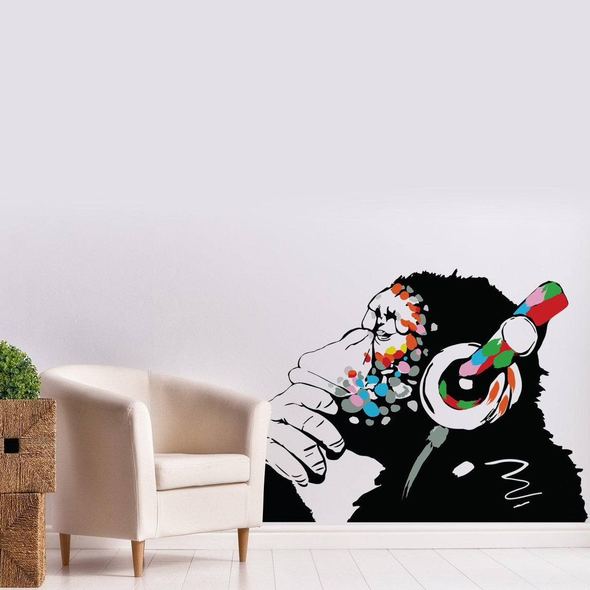 Banksy wall art monkey sticker decal featuring a colorful monkey with headphones, perfect for urban decor.