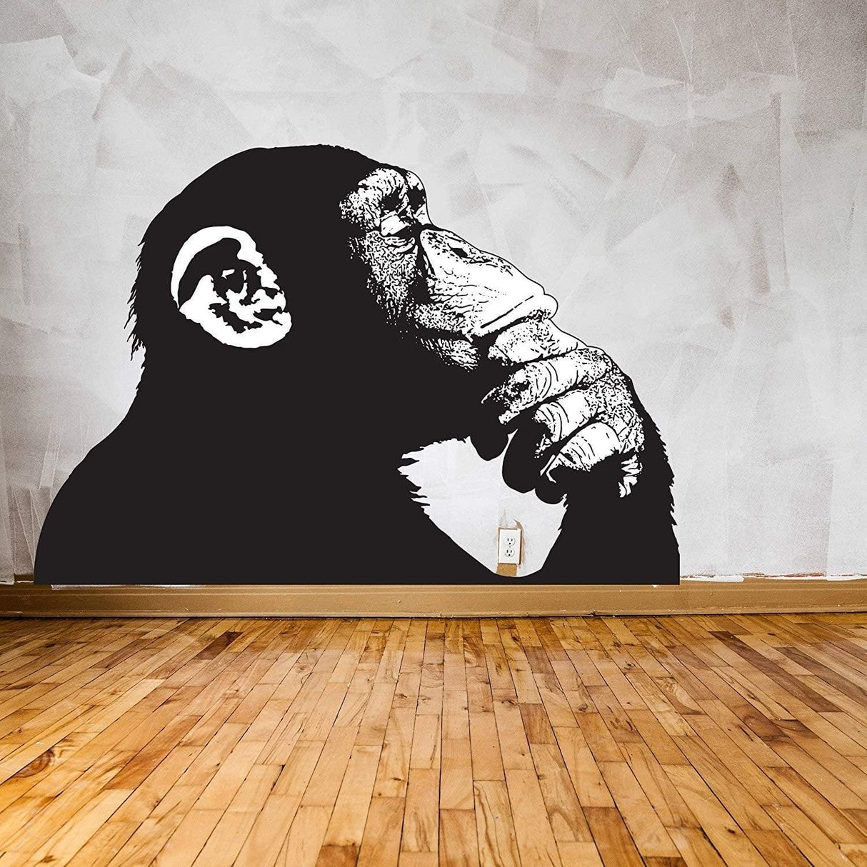 Large Banksy monkey wall sticker with headphones, adding style and humor to any room.