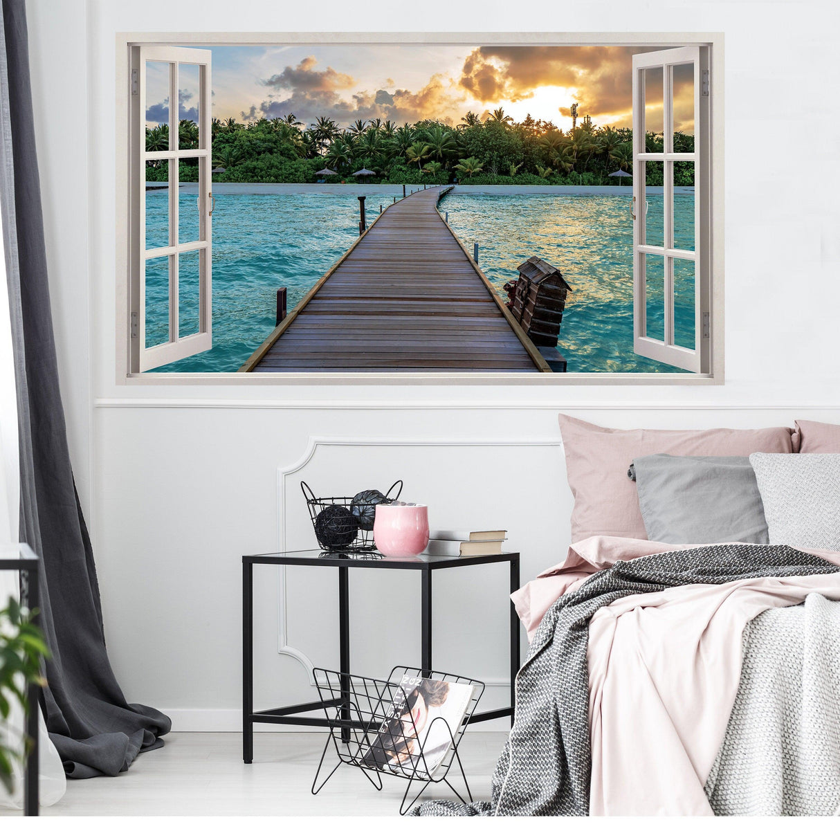 3D window beach view wall sticker featuring a tranquil ocean scene with a wooden pier and sunset in a bedroom setting.