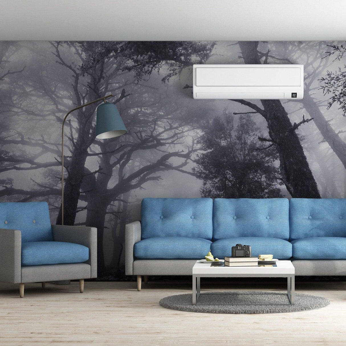Room featuring Foggy Forest Wallpaper Decal with misty trees, blue sofas, and modern decor.