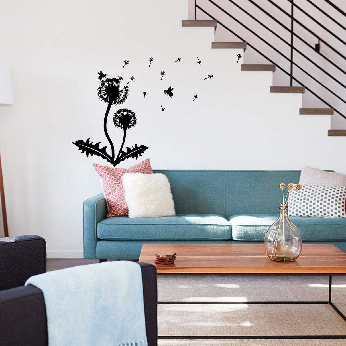 Dandelion wall decor decal in modern living room, featuring large flower design and whimsical seeds.