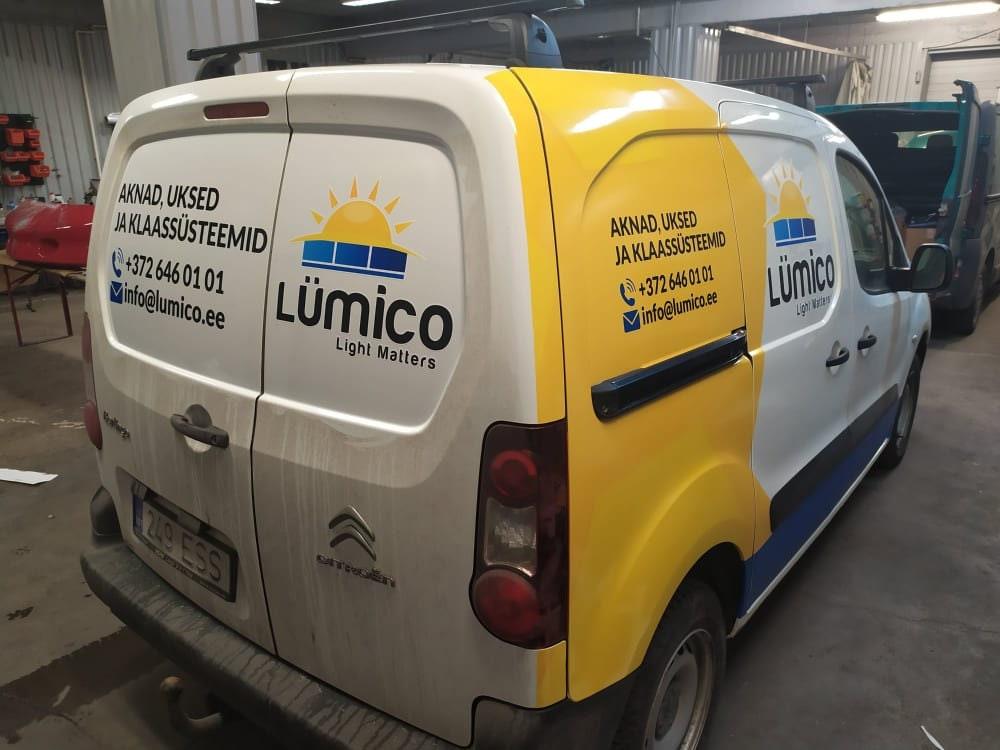 Custom vinyl decals on a delivery van with Lumico branding and contact information for light malters.