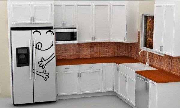 Funny happy face refrigerator decal on a white fridge in a modern kitchen setting.