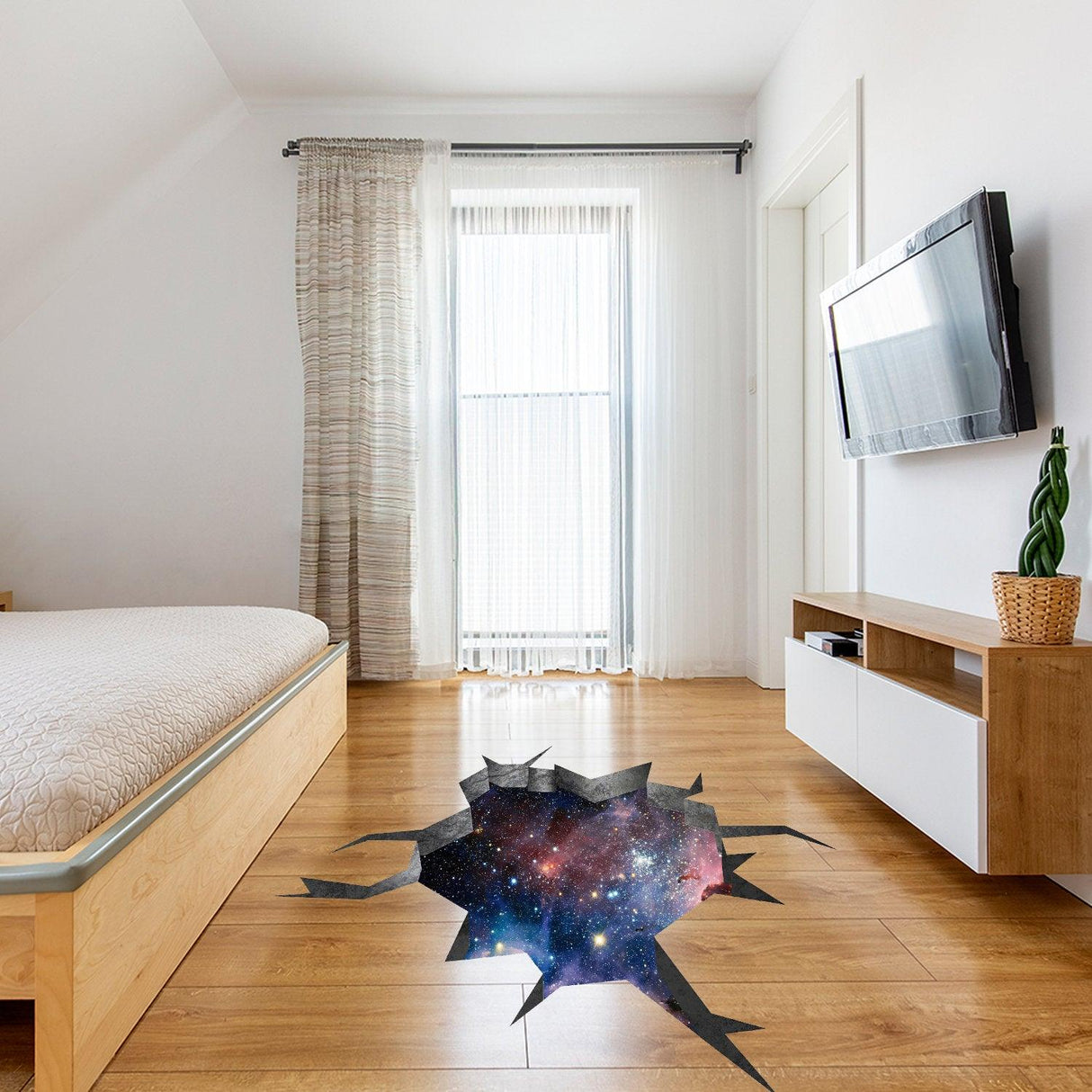 3D floor space portal hole decal in a modern bedroom, creating a galaxy art illusion on the wooden floor.