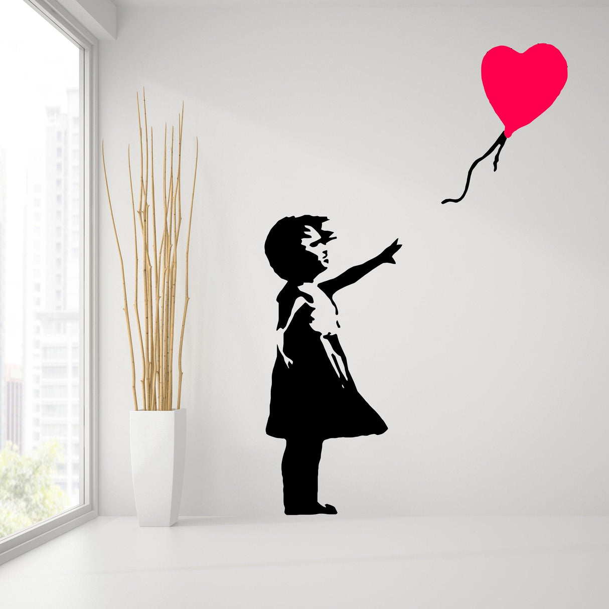 Banksy Girl With The Red Balloon Wall Decal on a modern interior wall, showcasing iconic street art.