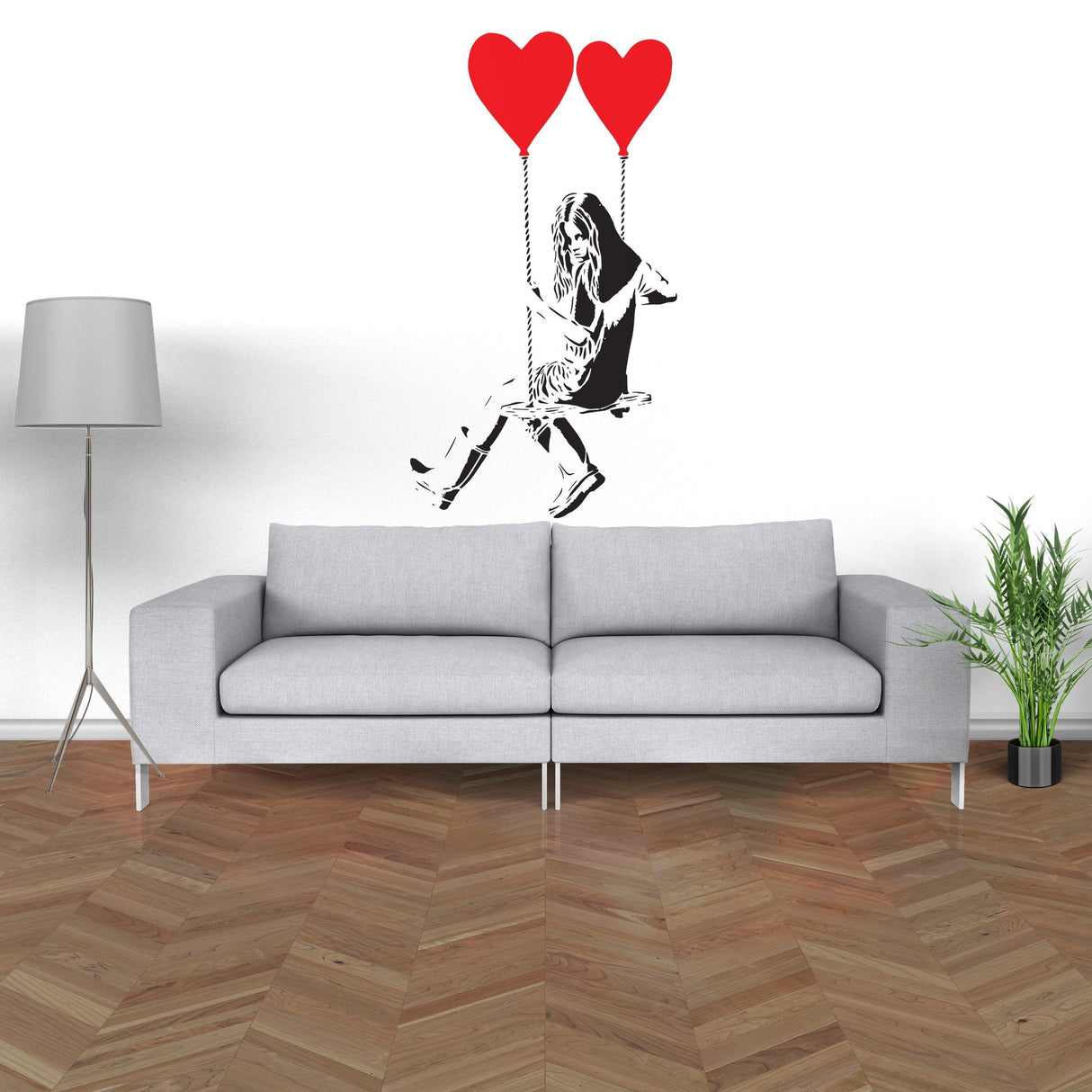 Banksy girl with heart balloon wall sticker above a modern couch in a stylish living room decor.