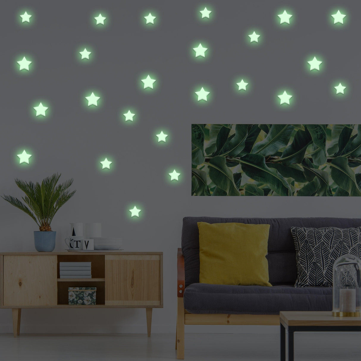 Glow in the dark star stickers on a wall, creating a magical ceiling decor for kids' rooms.