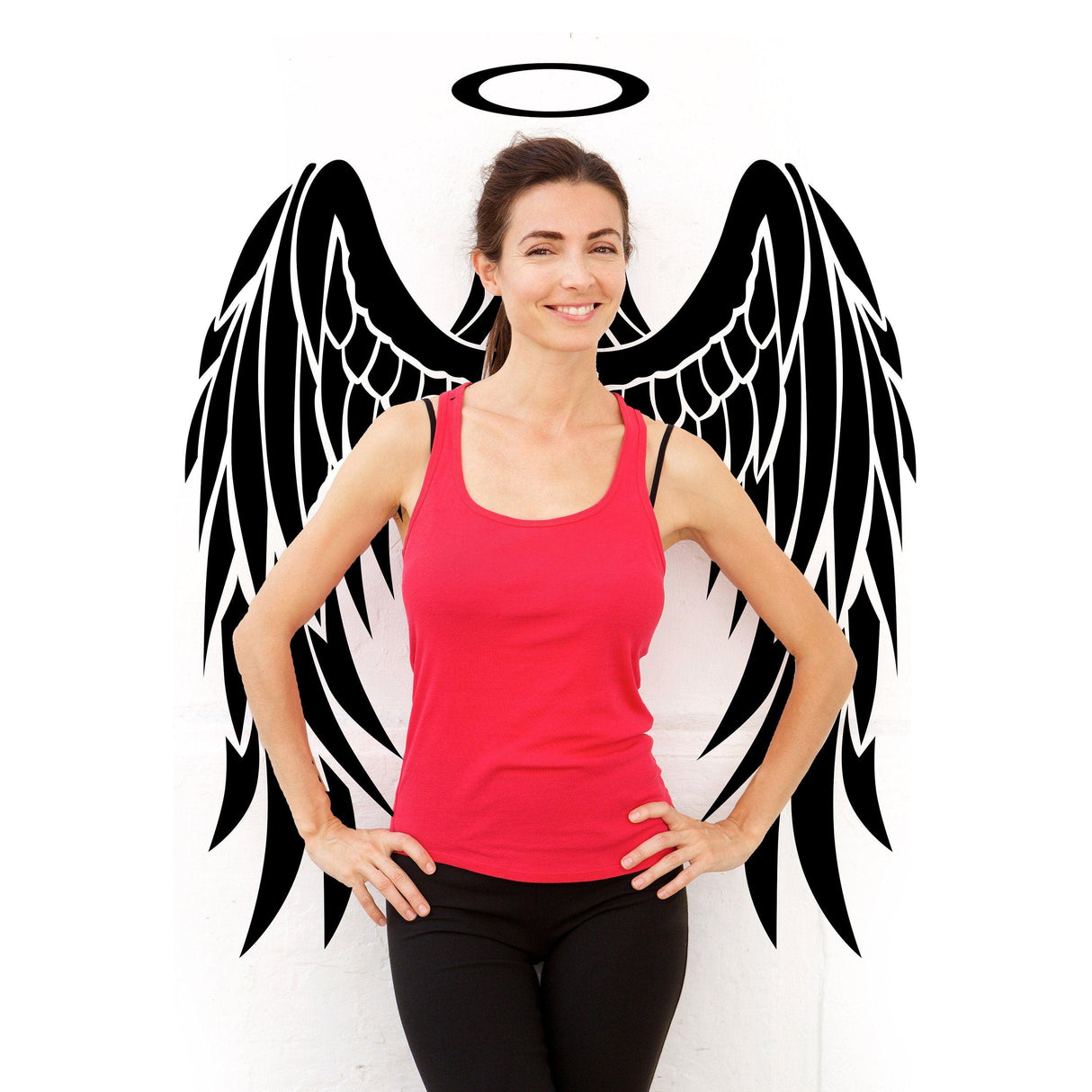 Angel wings wall decor vinyl decal with a smiling woman in a pink tank top, showcasing elegance and whimsy.
