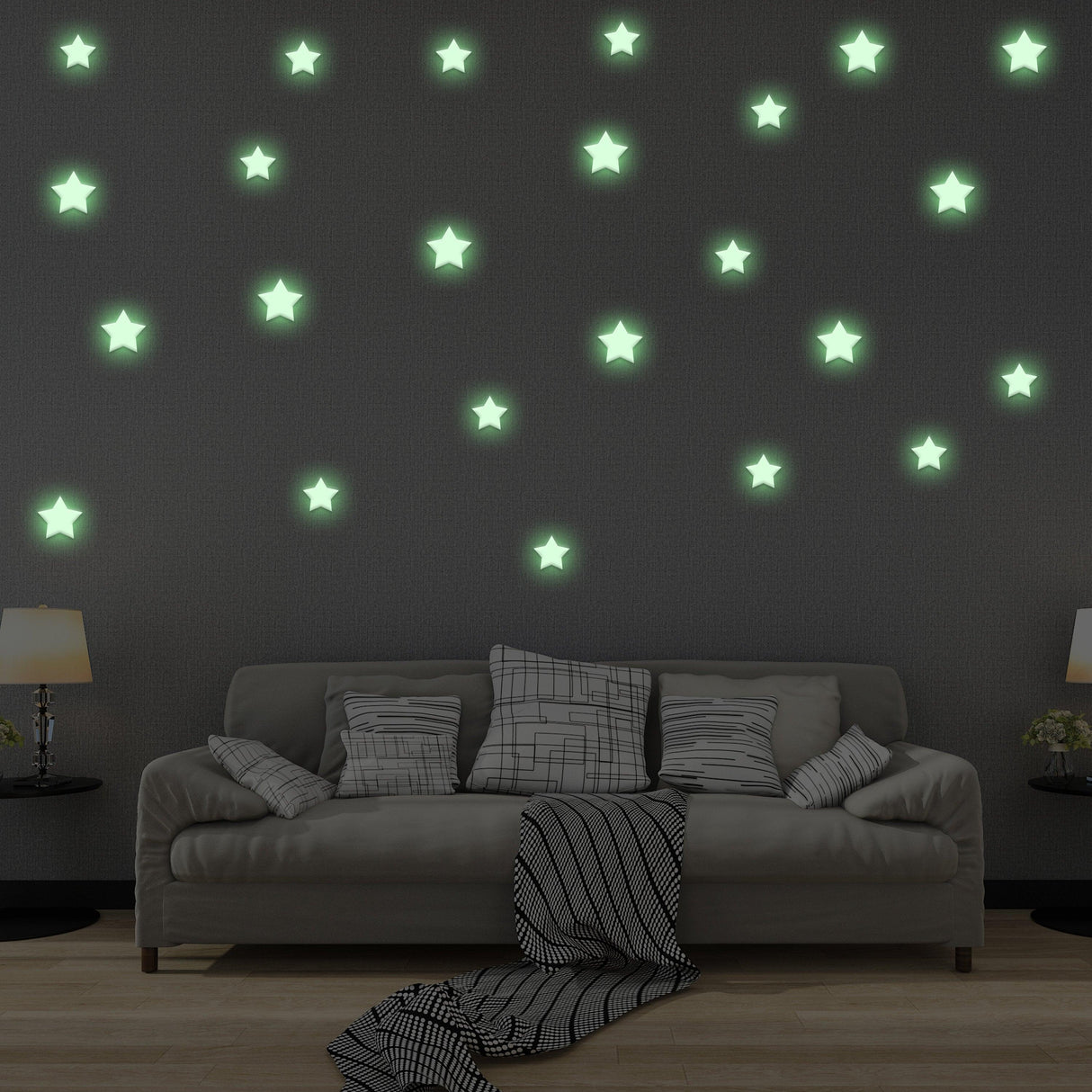 Glowing star stickers on a dark wall, creating a magical nighttime decor for kids' rooms.