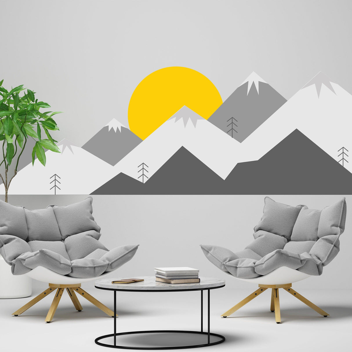 Mountain wall decal with yellow sun, gray peaks, and modern chairs in a stylish nursery decor setting.