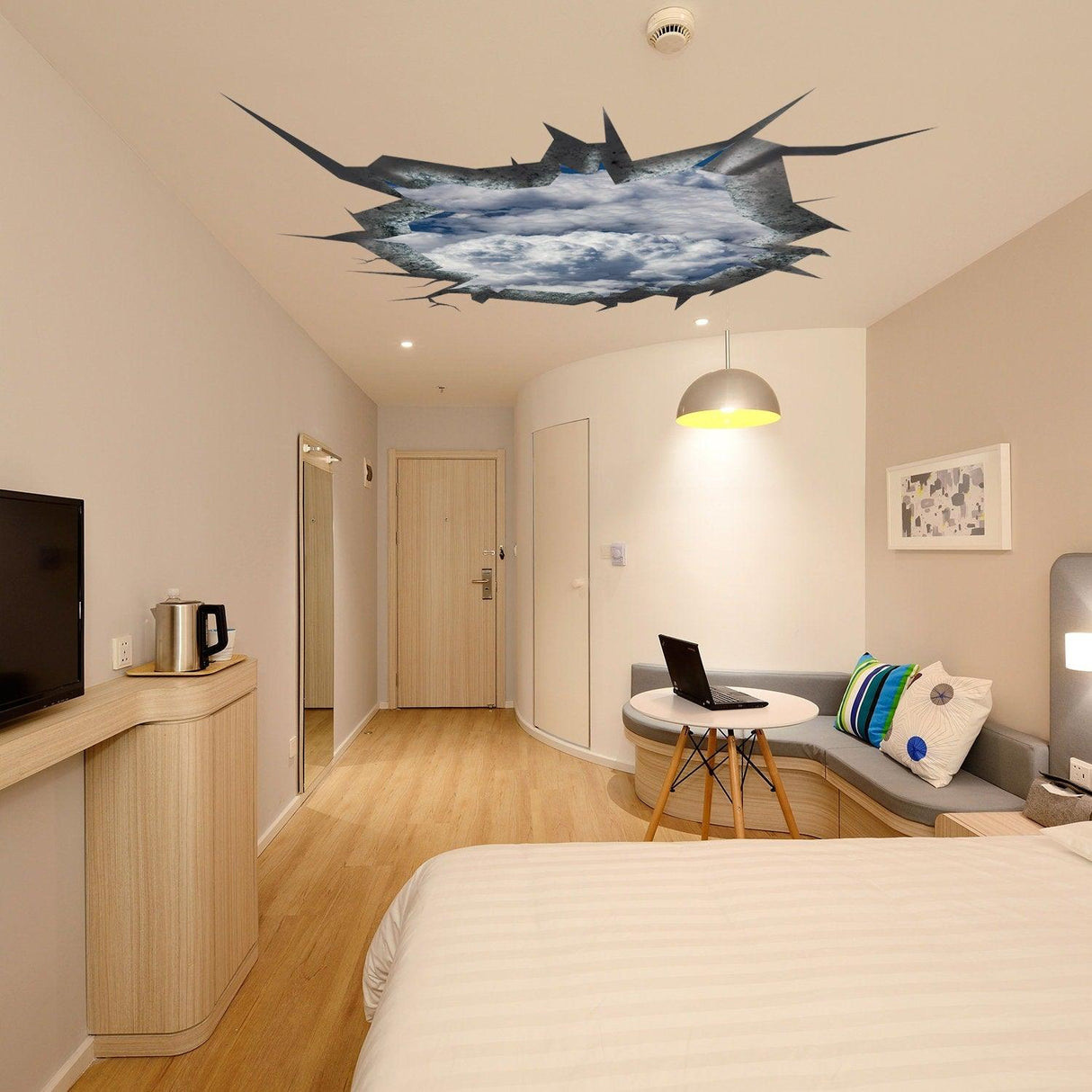 3D ceiling sticker of a blue sky in a bedroom, creating a porthole illusion for a dreamy decor.