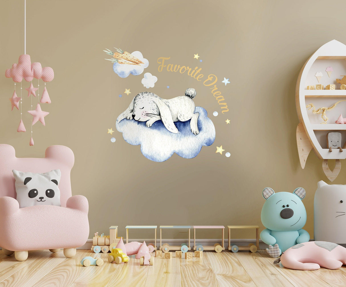 Whimsical baby nursery wall sticker featuring a sleeping bunny on a cloud with stars and the text 'Favorite Dream'.