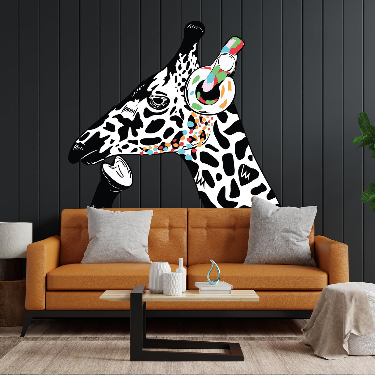 Giraffe wall art sticker featuring a DJ giraffe wearing headphones in a modern living room setting.