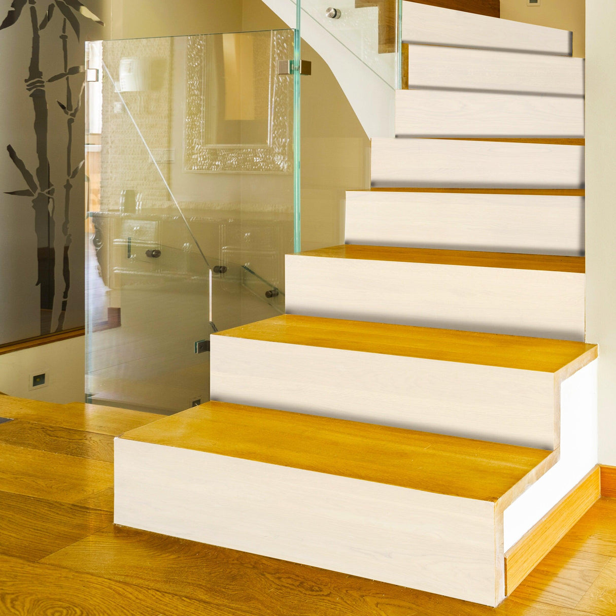 White self-adhesive stairs risers stickers applied on stylish wood staircase in modern home interior.