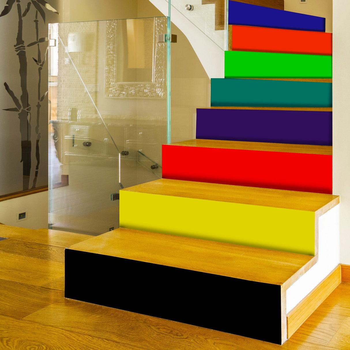 Colorful rainbow self-adhesive stair risers stickers applied on wooden staircase for vibrant home decor.