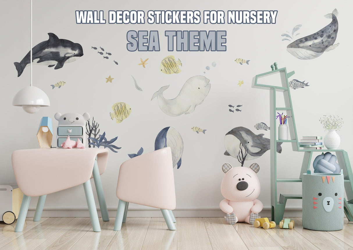 Ocean whales and sea creatures wall stickers for nursery decor in a playful undersea theme.