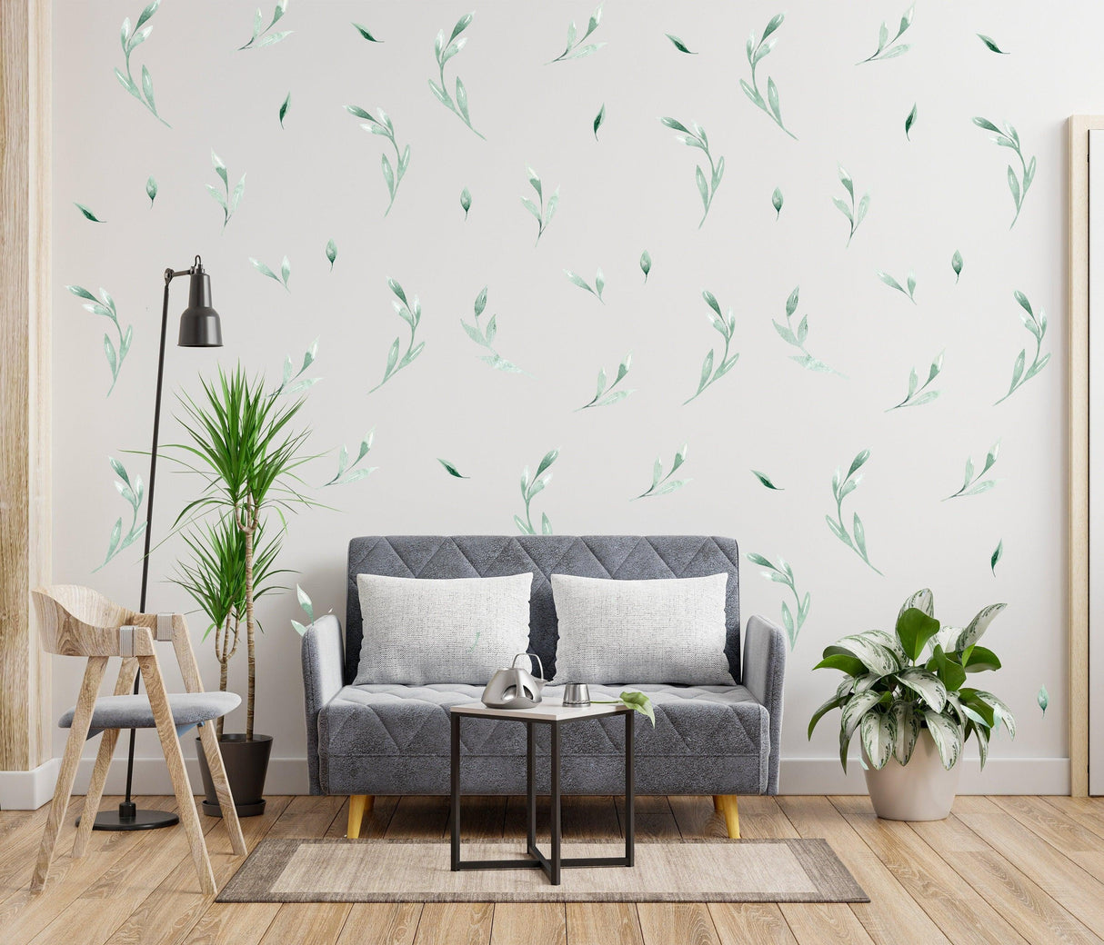 Stylish living room featuring olive botanical vinyl wall stickers and greenery for a fresh, sophisticated decor.