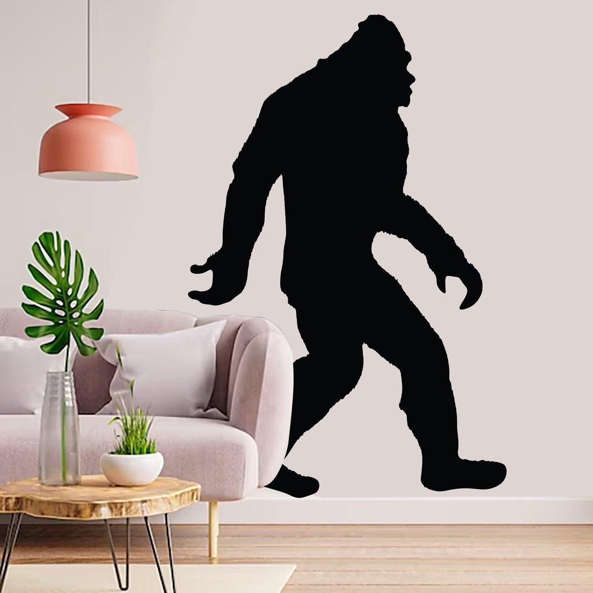 Big Foot Sasquatch vinyl wall decal silhouette in modern living room with pink lamp and green plant