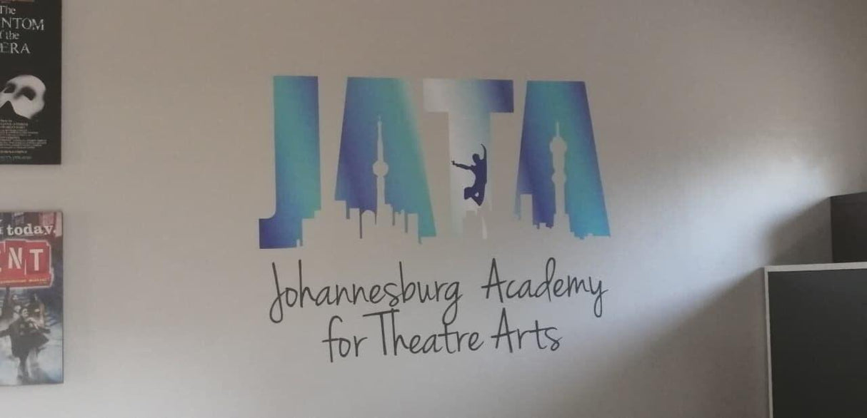 Custom wall decal featuring 'JATA' for Johannesburg Academy for Theatre Arts on a wall.