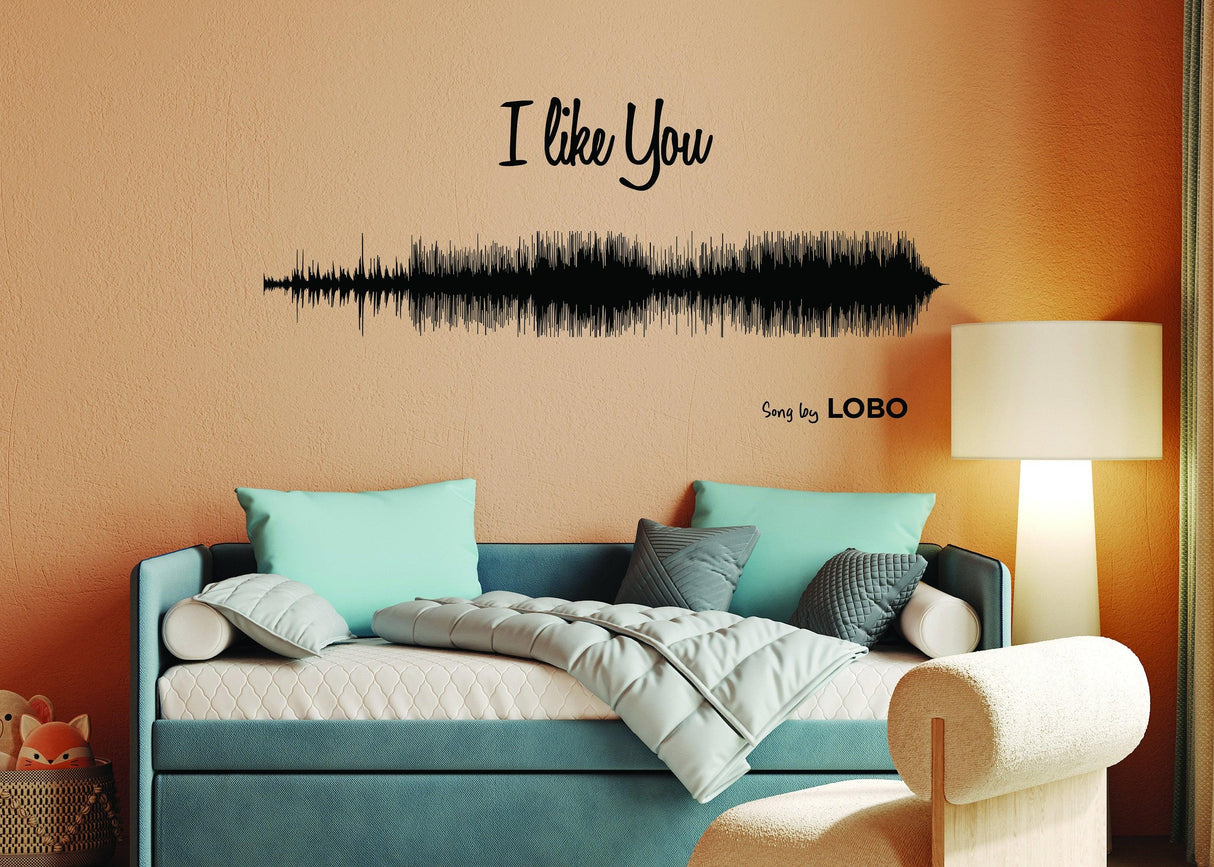 Personalized sound wave wall sticker featuring the phrase 'I like You' by Lobo in a cozy room setting.