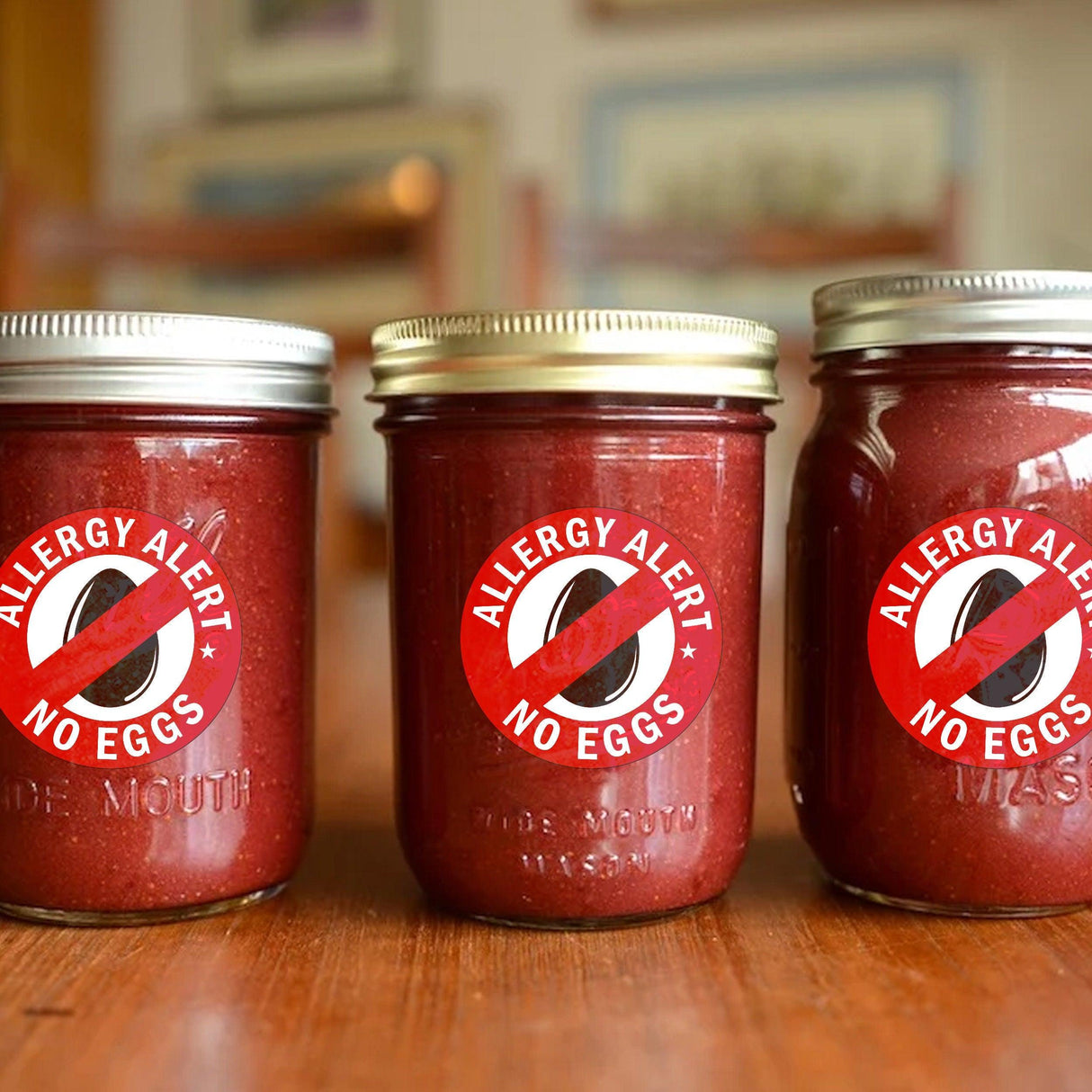 Three jars with 'Allergy Alert No Eggs' stickers promoting food allergy safety.