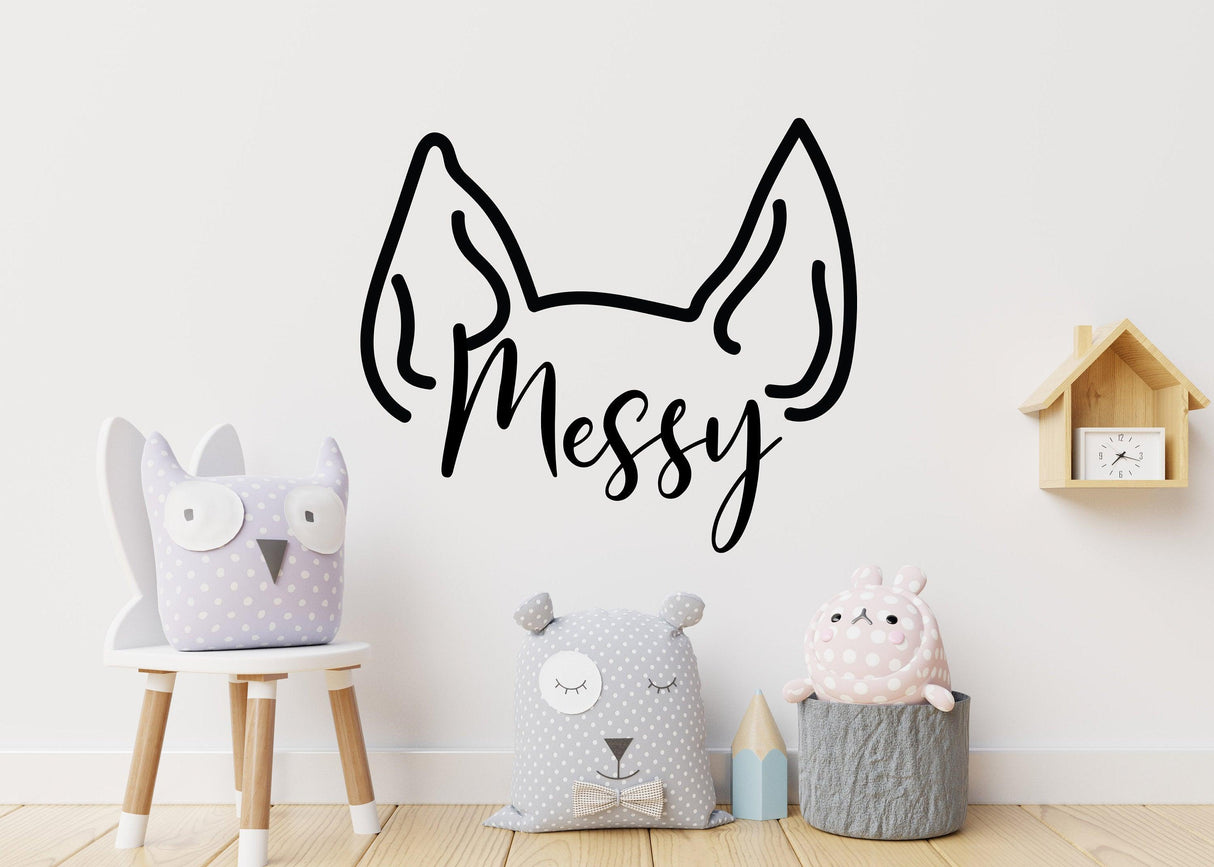 Customized animal ear wall decal with the word 'Messy' in a playful design, perfect for a fun room decor.