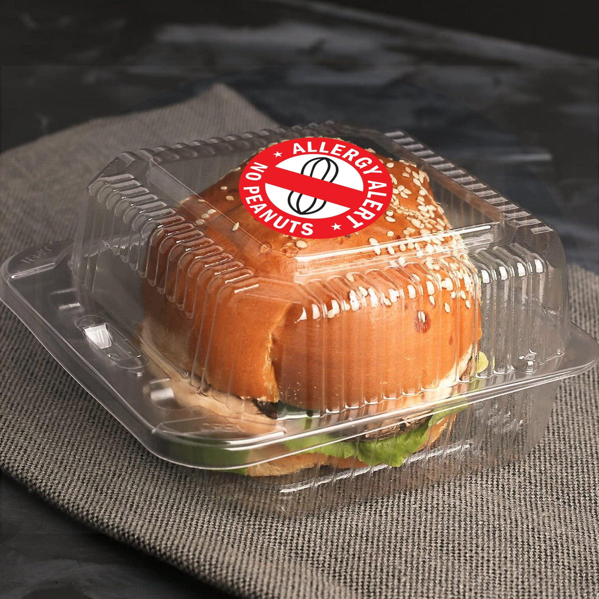 Peanut allergy alert sticker on a sandwich box, promoting safety for those with peanut sensitivities.