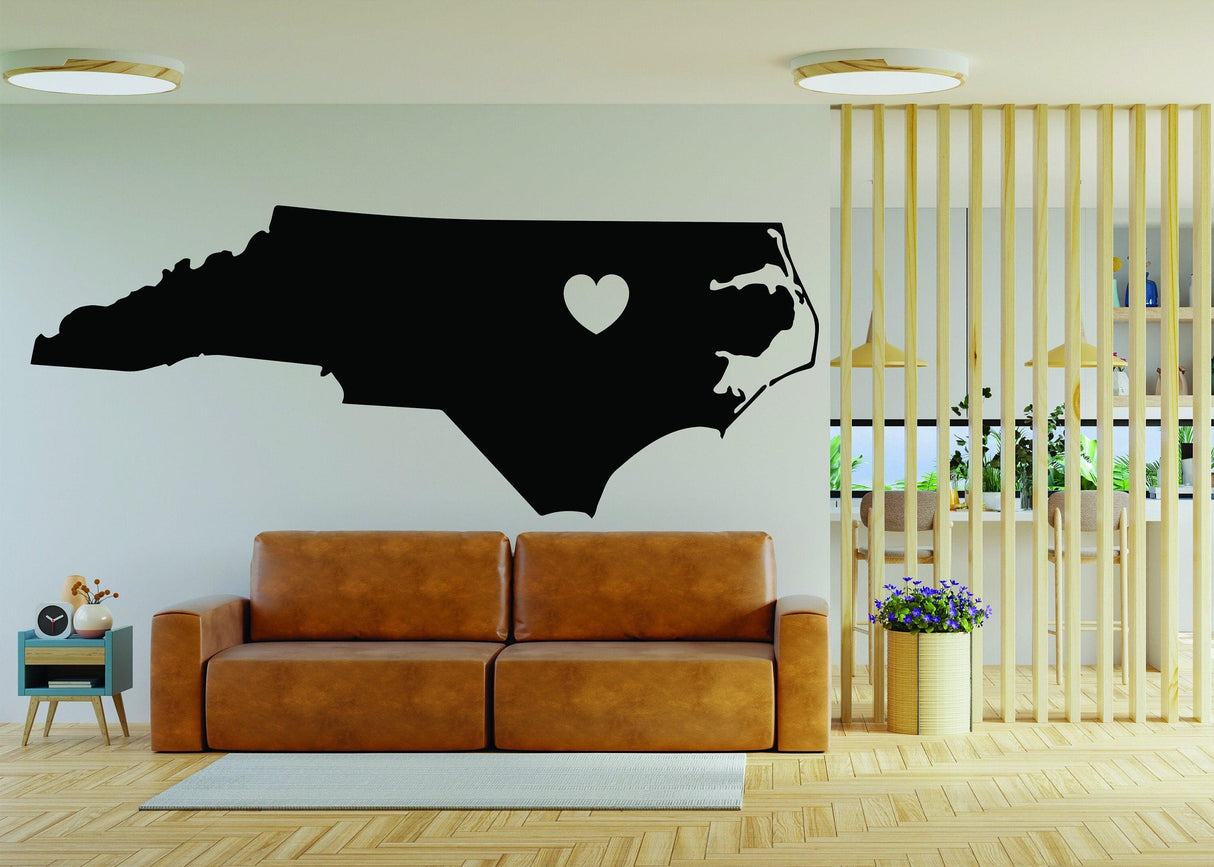 North Carolina wall decal featuring a heart in the state outline, perfect for NC lovers and home decor.