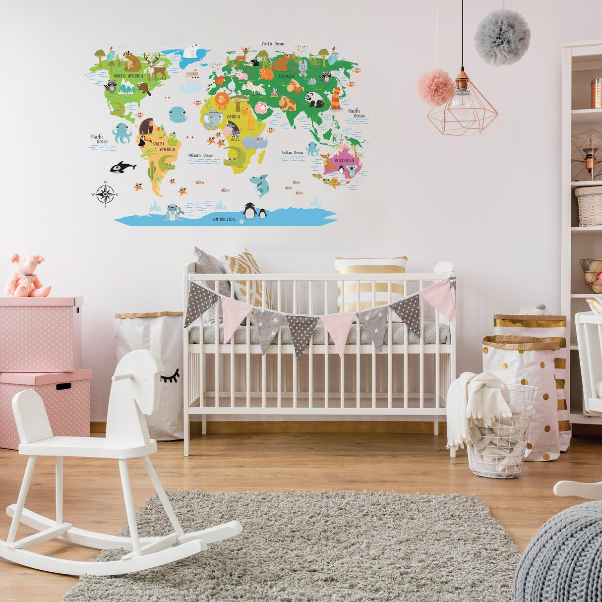 Colorful world map decal on nursery wall above crib, adding adventure and education to the child's room.