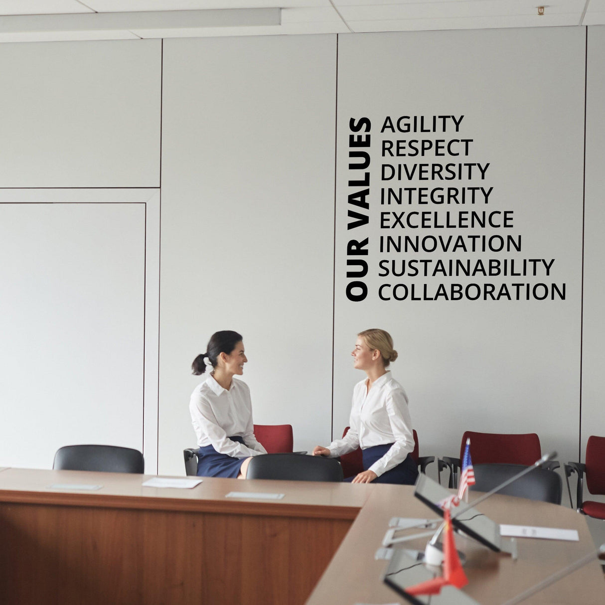 Our Values Office Wall Decal featuring keywords like agility and collaboration, enhancing a modern conference room.