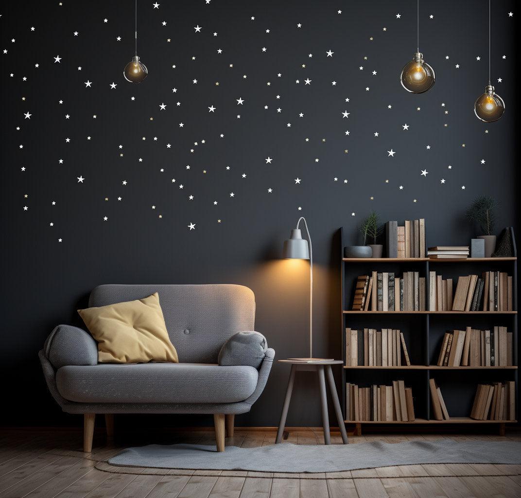 Elegant white stars wall vinyl stickers on a black wall, creating a cozy room with a sofa and bookshelf.