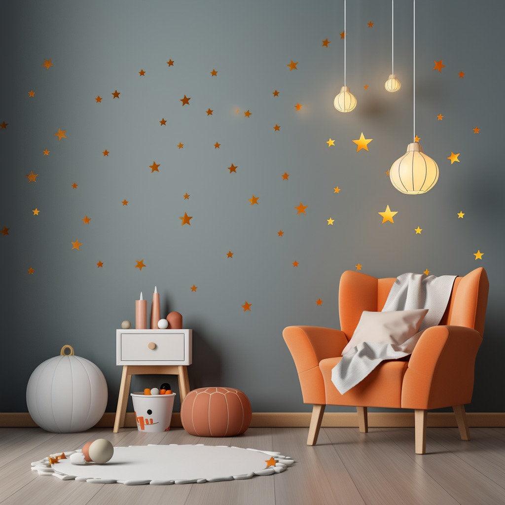 Cozy living room with orange chair, stars wall decals, pendant lights, and playful decor accents.