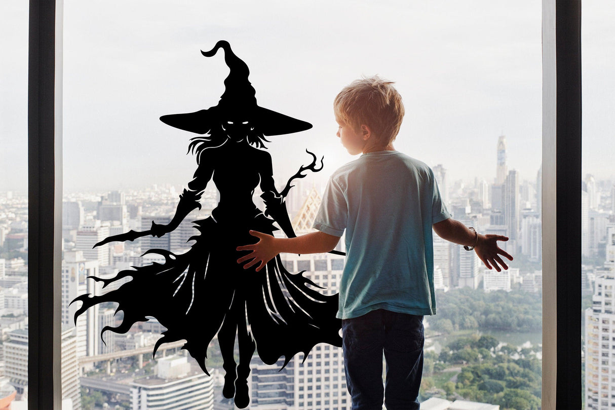 Child admiring a Knife-Wielding Warrior Witch decal on a window overlooking a city skyline.