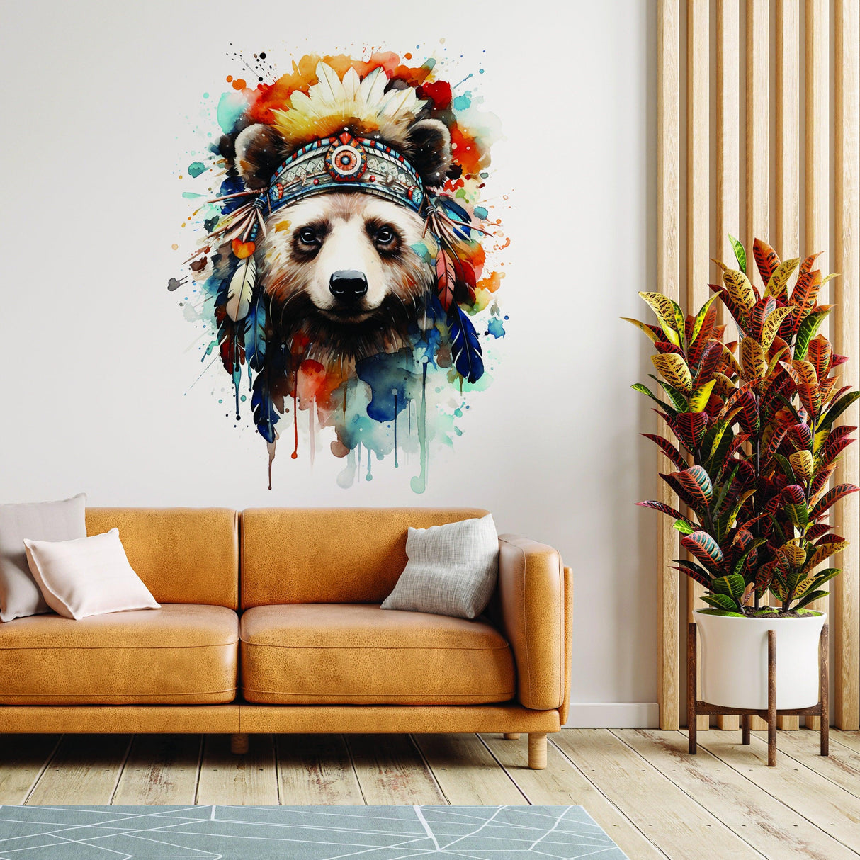 Colorful watercolor baby panda wall decal with feathers in a stylish nursery setting.
