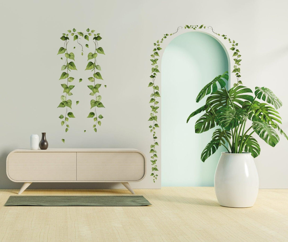 Hanging vine wall sticker featuring green ivy leaves in a stylish living room with a plant and modern decor.