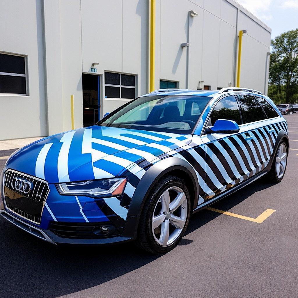 Audi car with striking blue and white geometric vinyl wrap, showcasing trendy design and style.