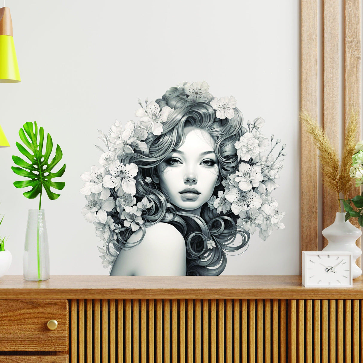 Elegant woman silhouette with floral mind decal, stylish vinyl wall art for home decor.
