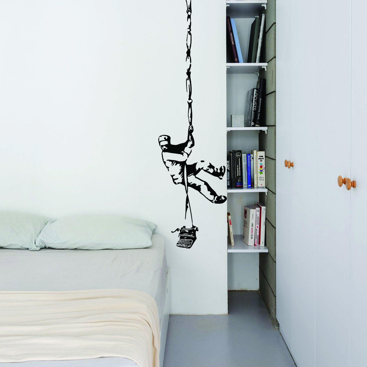 Banksy Prisoner Escape Wall Decal on bedroom wall, featuring an escaping prisoner in graffiti style.