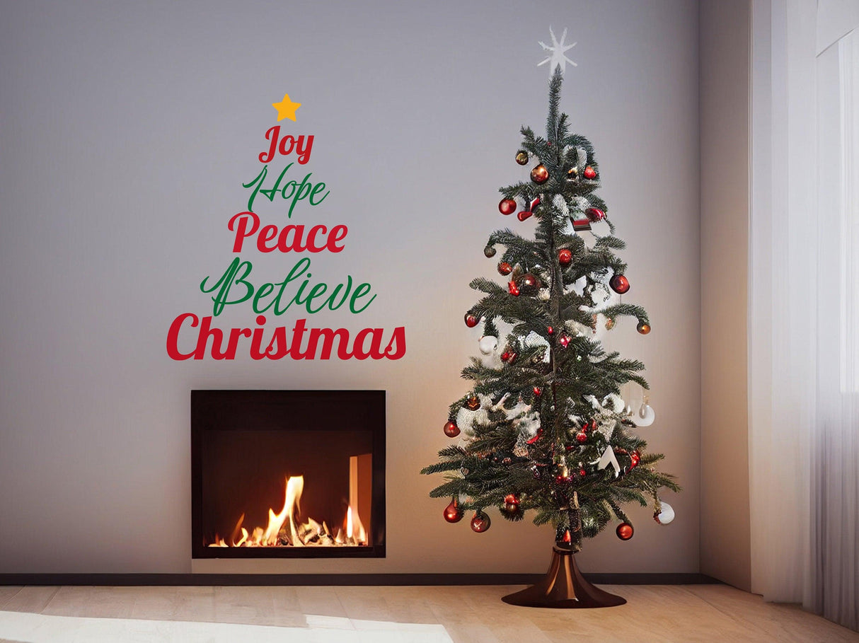 Colorful Christmas quote wall decal with tree design and text 'Joy Hope Peace Believe Christmas' above a decorated tree.
