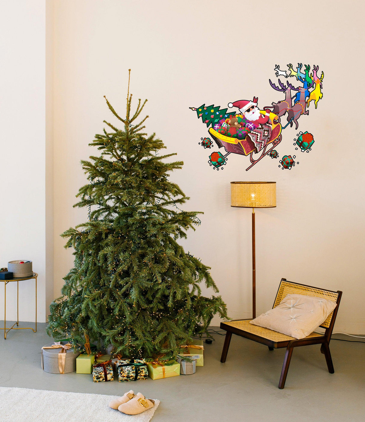 Colorful Santa in glasses on sleigh wall decal above Christmas tree and gifts, adding festive humor to holiday decor.