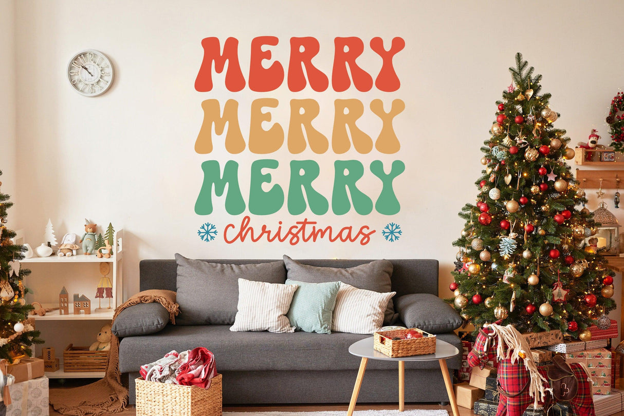 Festive Christmas vinyl sticker featuring colorful 'Merry Merry Merry Christmas' text on a cozy living room wall.
