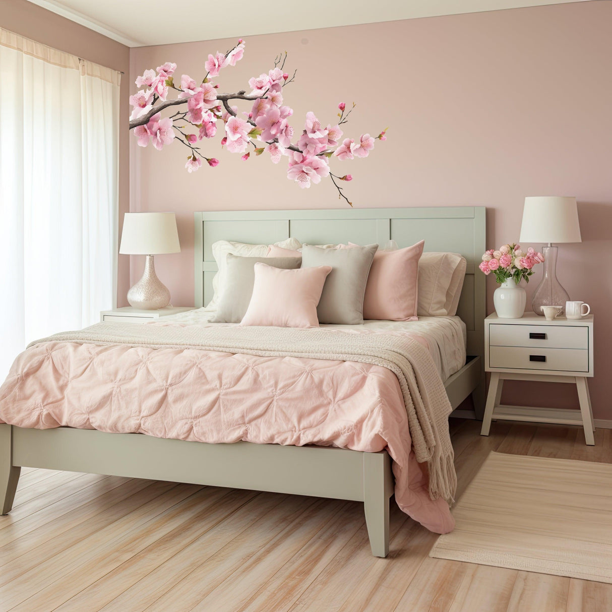 Pink cherry blossom tree branch wall decal enhancing a serene nursery bedroom decor.