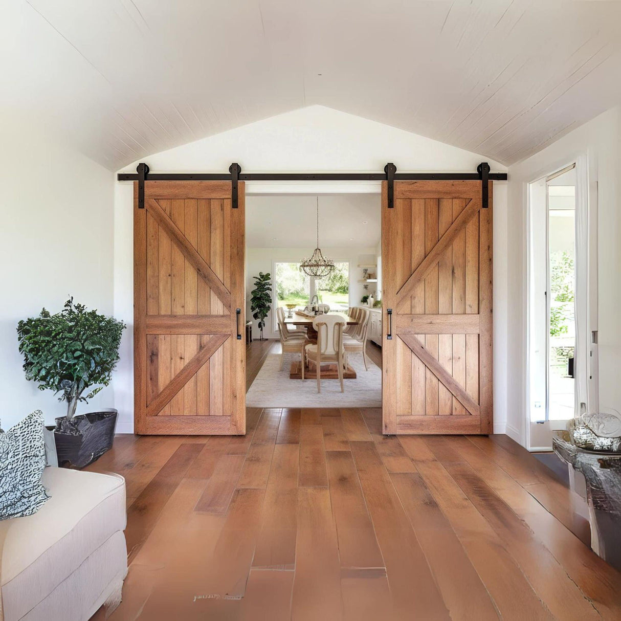 Brown rustic barn doors sliding open in a cozy interior with wooden floors and modern decor.