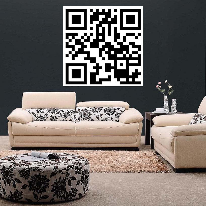 Custom QR code sticker on wall above stylish beige couches in modern living room setting.