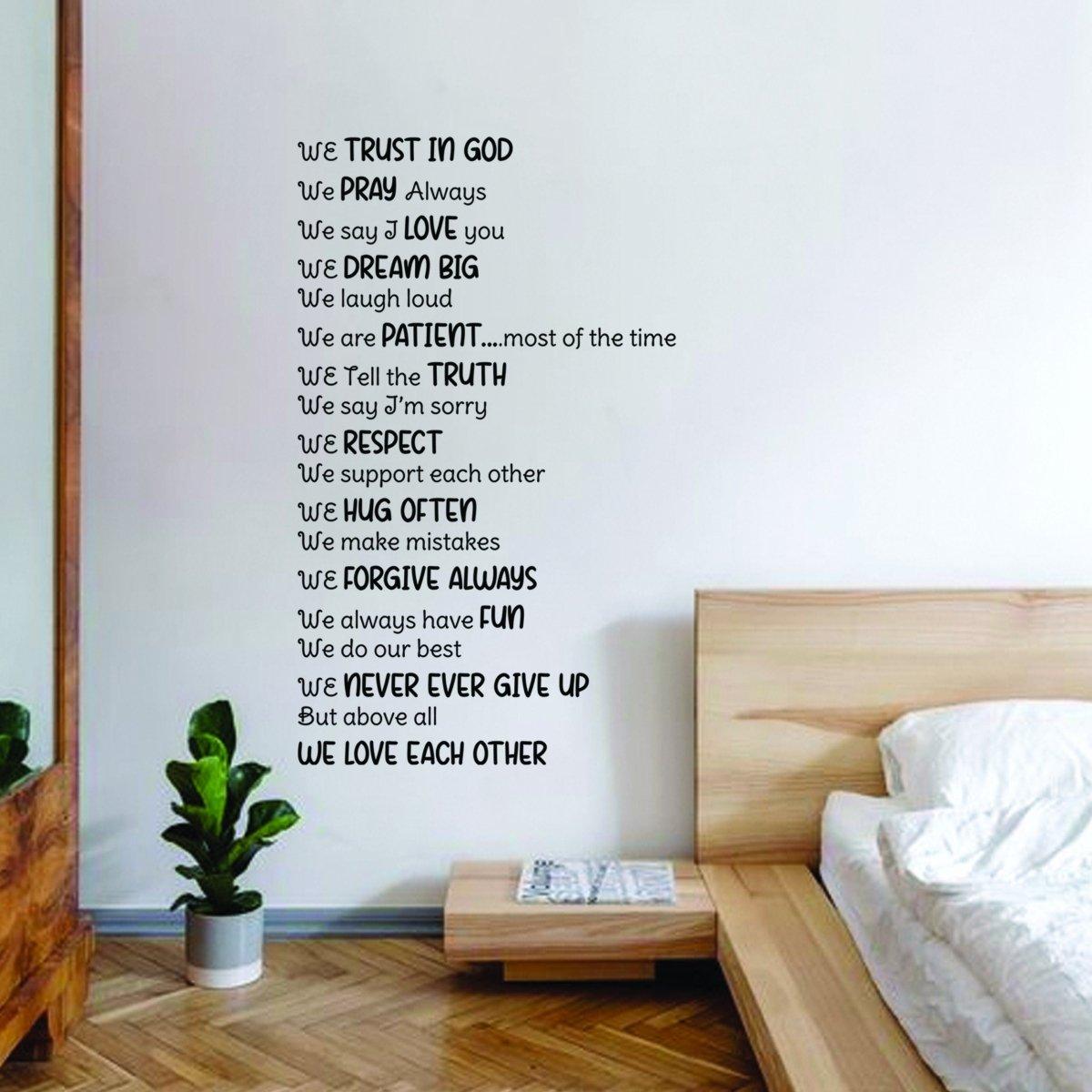 Inspirational family quote wall decal featuring love, faith, and uplifting messages for home decor in a cozy bedroom.